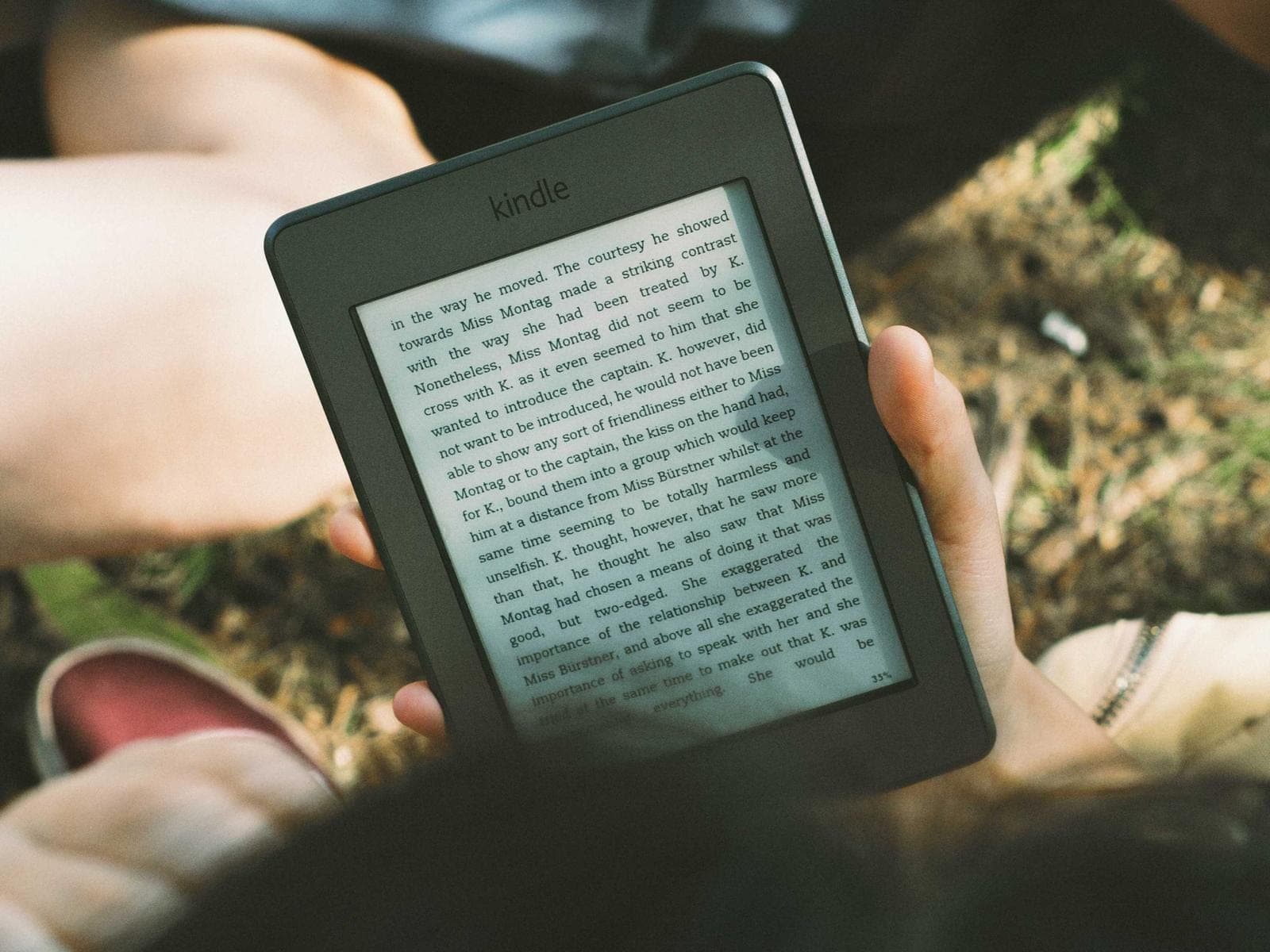 Hands holding a reading device